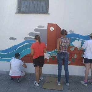 si lavora al murales della Fattoria Albogatti